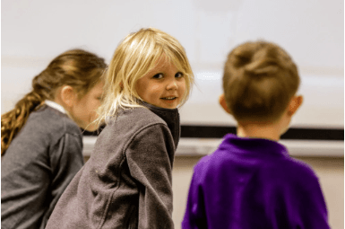 Citadel Christian School students smiling in classroom learning environment